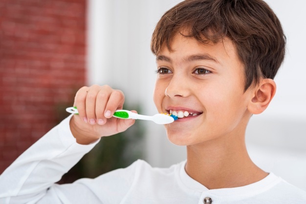 front-view-young-boy-brushing-theets_23-2148355189